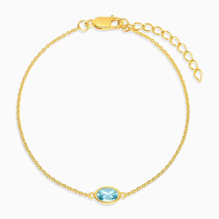 December birthstone bracelet in gold with blue topaz. Crystal bracelet with blue Topaz in gold.