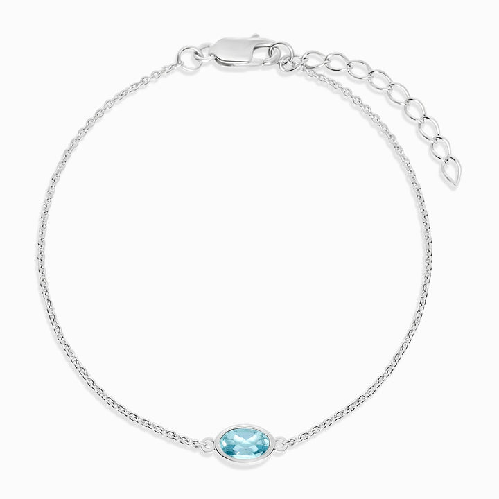 Crystal bracelet with blue Topaz December birthstone. Silver bracelet with blue Topaz gemstone.