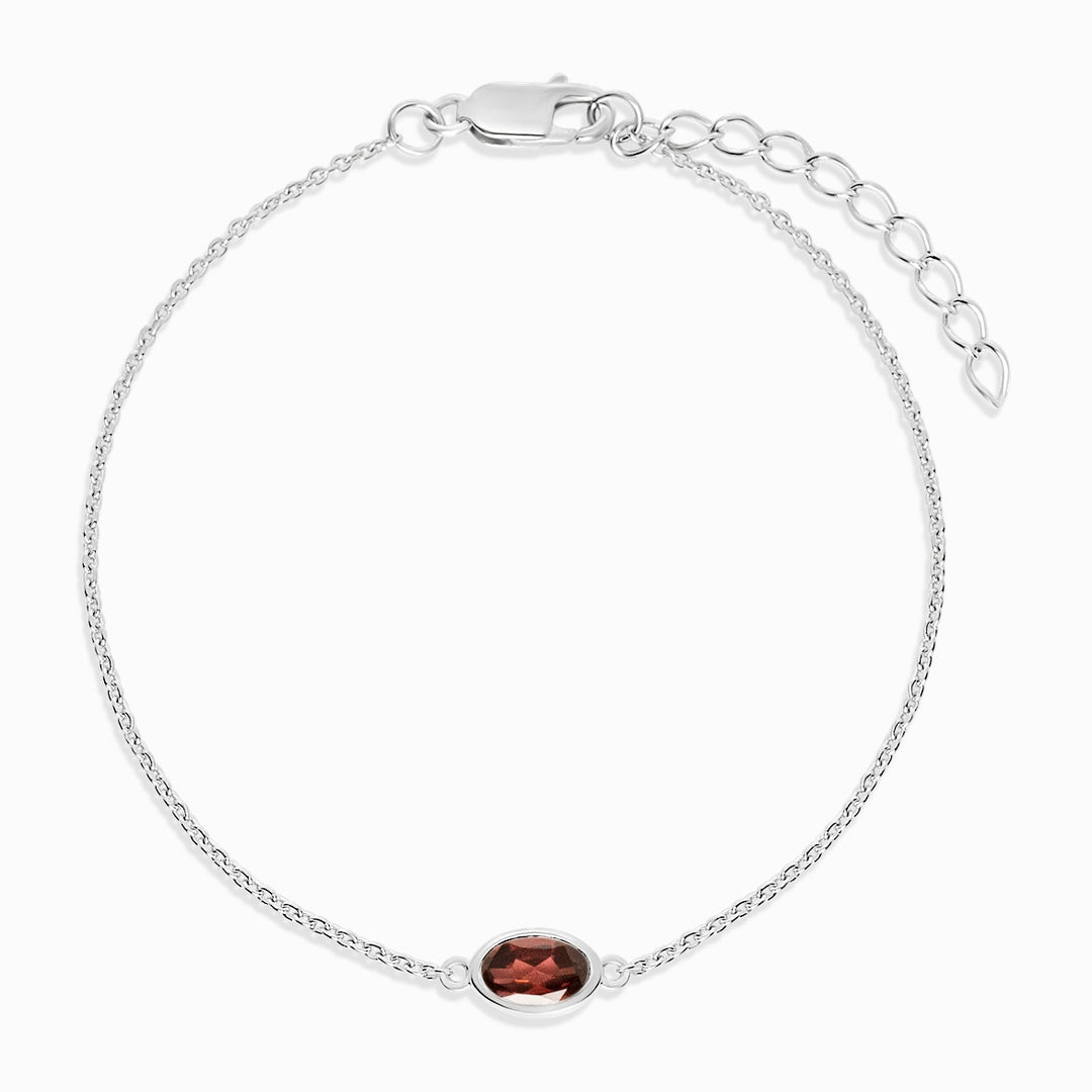 Bracelet with January birthstone Garnet. Silver bracelet with red gemstone Garnet.