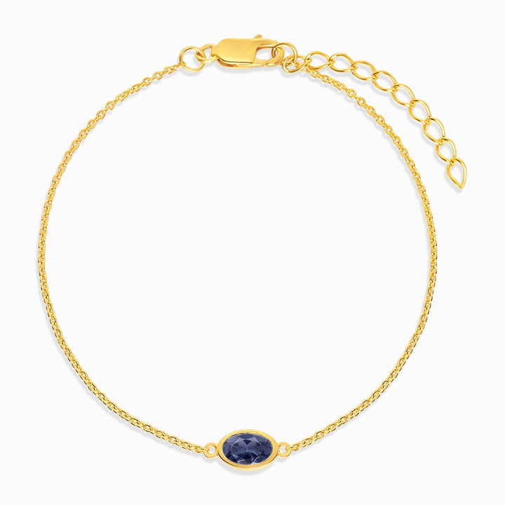 Gold bracelet with September birthstone iolite. Bracelet in gold with crystal Iolite, which is September's birthstone.