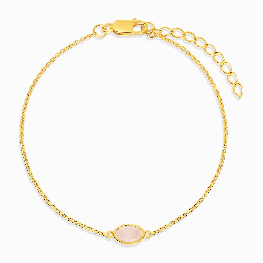Crystal bracelet with Rose Quartz in gold. October birthstone bracelet in gold with pink crystal Rose quartz that symbolizes love.
