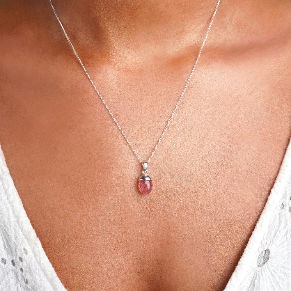 Necklace with tumbled crystal of Strawberry Quartz which is October's month stone. Jewelery with red stone Strawberry quartz in tumbled to wear as a necklace.