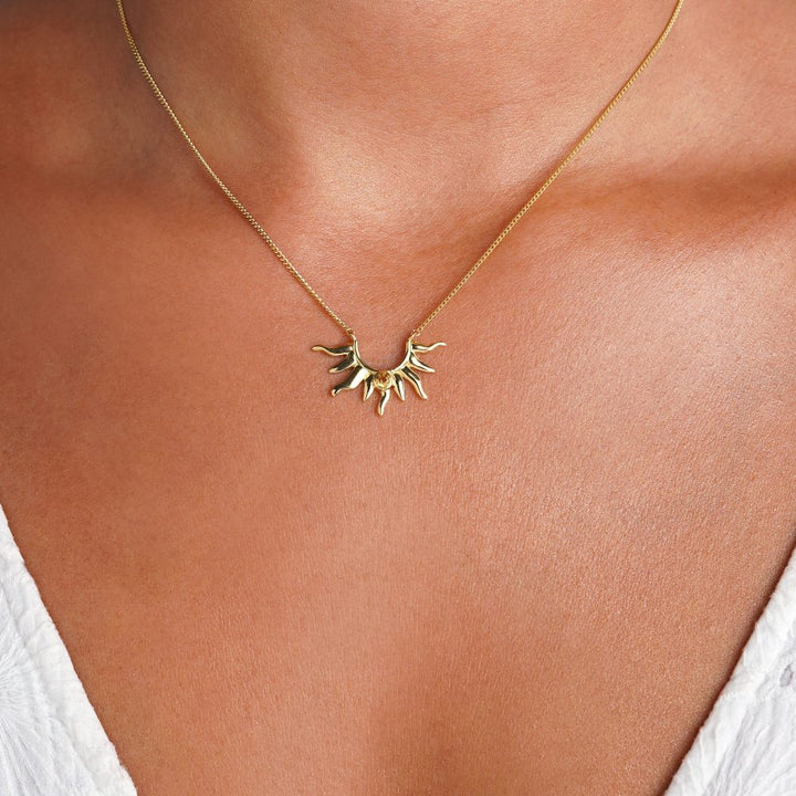 Citrine necklace with a sun in gold. Gemstone necklace with a beautiful sun and Citrine crystal in gold.