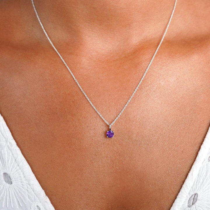Jewelery with the February birthstone Amethyst. Necklace with purple crystal Amethyst in sterling silver.