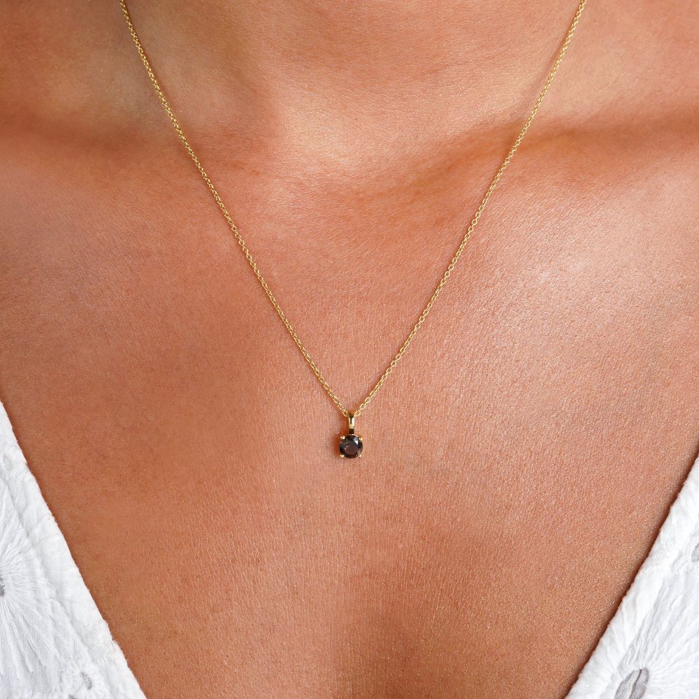 Jewelry with Smoky quartz that stands for protection. Necklace with crystal Smoky quartz in gold.