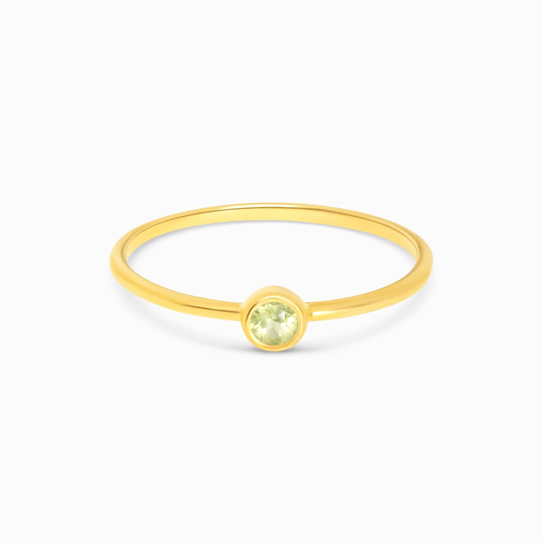  Peridot ring in gold. Modern gold ring with crystal Peridot.