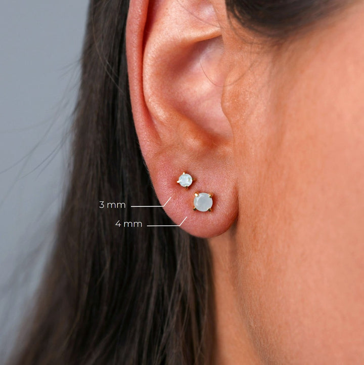 Aquamarine stud earrings in gold. Classy gemstone earrings with blue crystal Aquamarine.