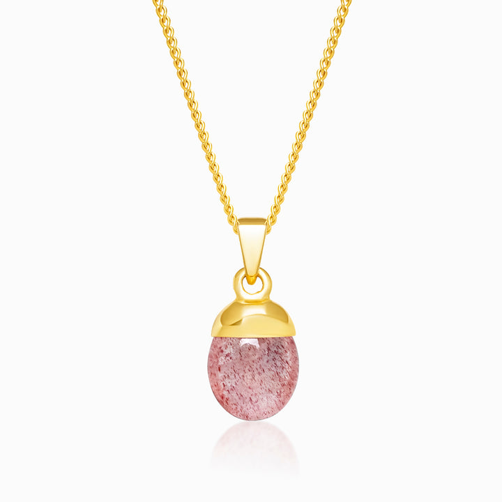 Strawberry quartz necklace in gold. Crystal jewelry with red pink stone Strawberry quartz to wear as a necklace.