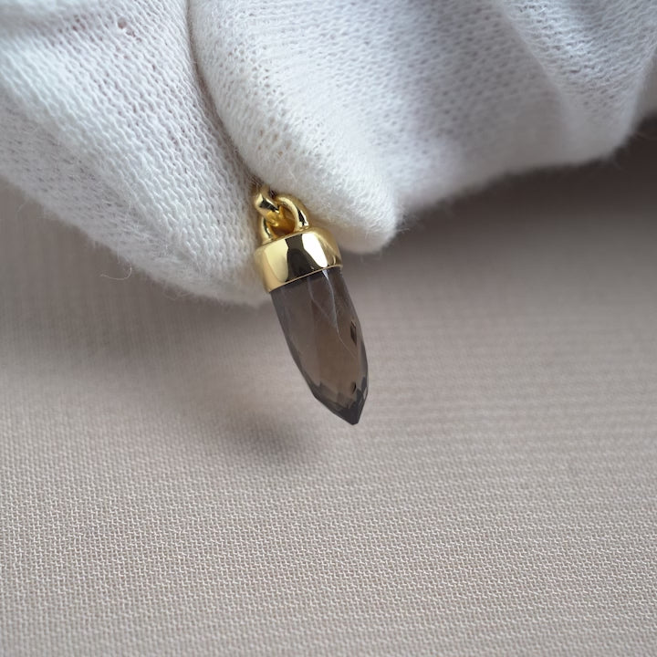 Gold peandant with Smoky quartz gemstone shaped into a mini point. Mini point in Smoky Quartz for necklace with gold details.
