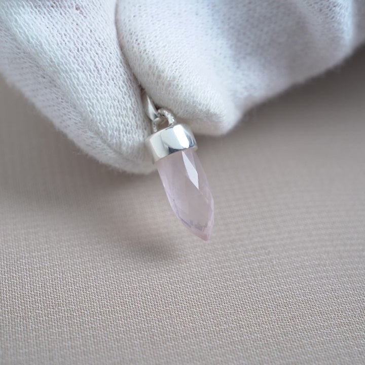 Small Rose quartz charm to hang around the neck. Love stone to wear around the neck.