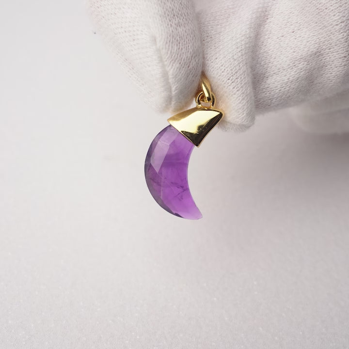Amethyst moon pendant with gold details. Magical crystal jewelry with the purple gemstone Amethyst.