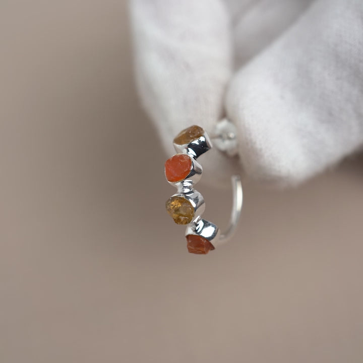 Raw gemstone hoop earrings in silver. Gemstone earrings with raw Carnelian and Citrine crystals.