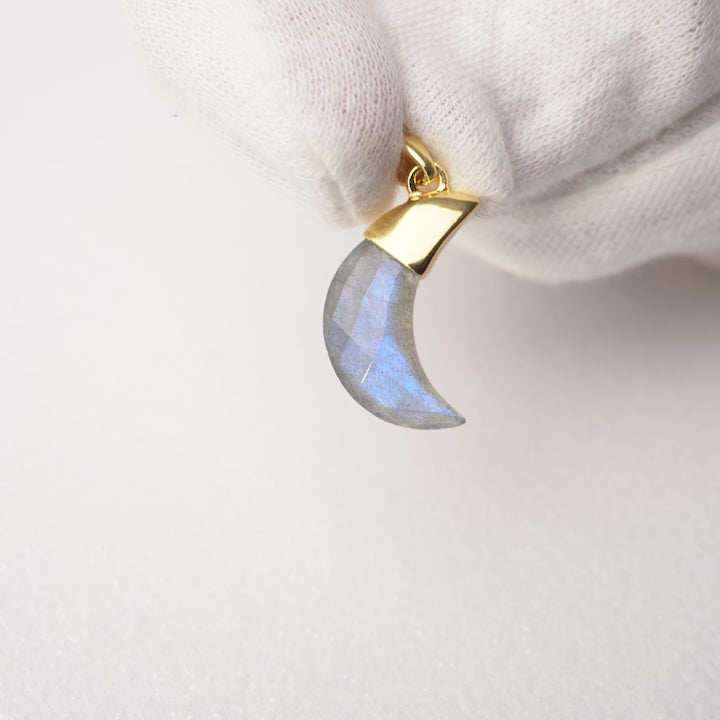 Crystal Moon of Labradorite with gold details. Gemstone pendant with Labradorite shaped into a moon.