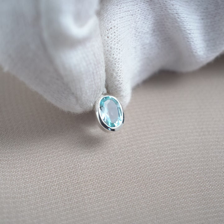 Crystal charm with Blue Topaz gemstone in sterling silver. Crystal jewelry with Blue Topaz in silver.