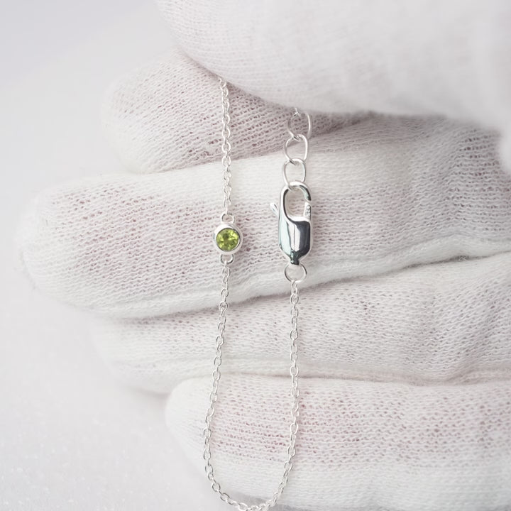 Gemstone bracelet with green Peridot gemstone. Silver bracelet with green crystal Peridot, also the birthstone of August.