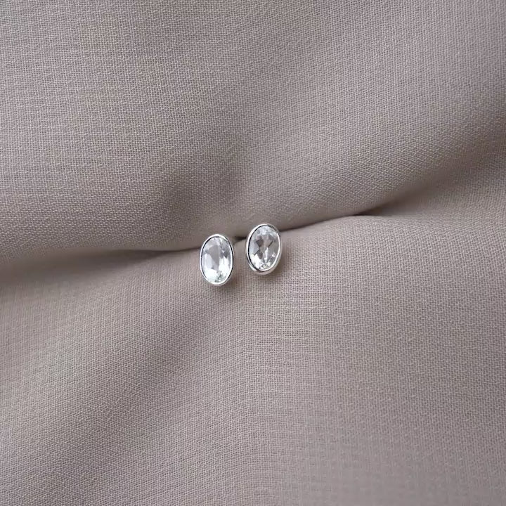 Clear Quartz silver earrings in a classy and beautiful design. Silver stud earrings with crystal Clear Quartz.