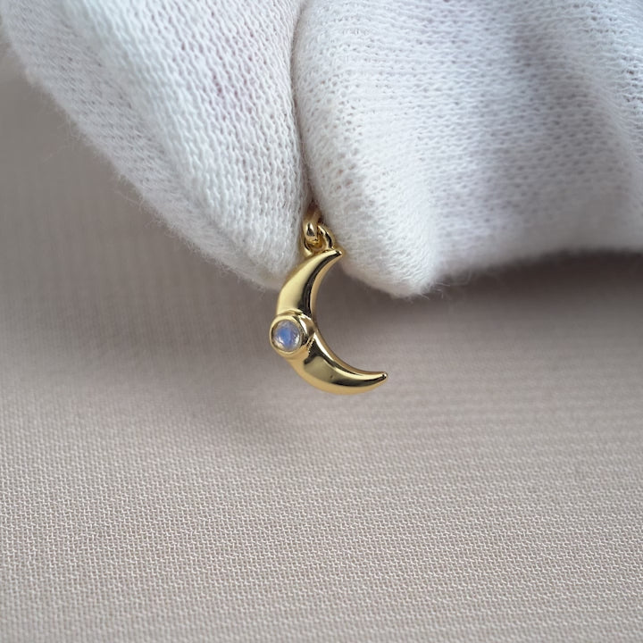 Crystal charm with a crescent moon in gold and Rainbow Moonstone crystal. June birthstone charm with Moonstone and magical moon in gold.