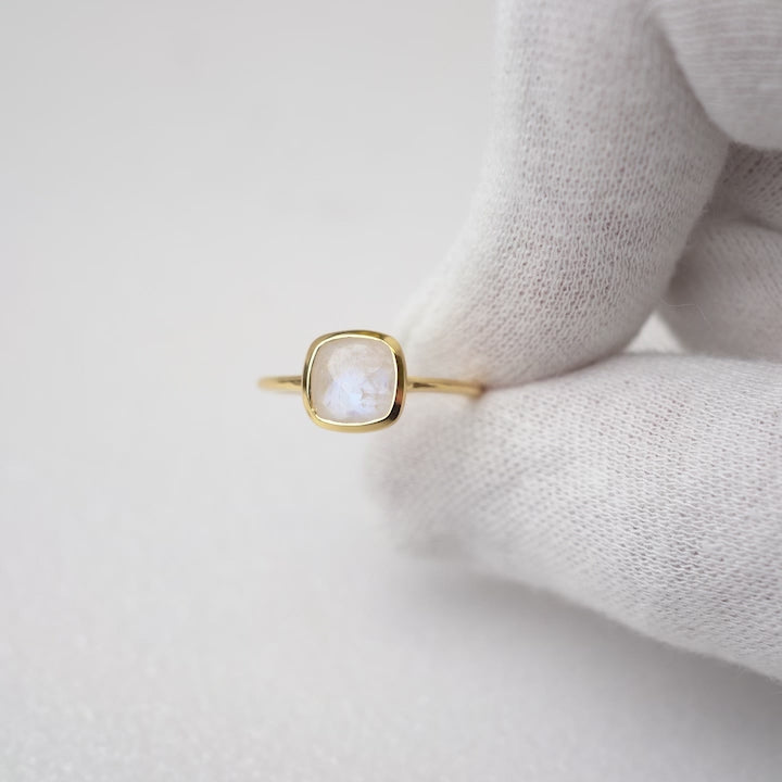 Classy and sparkly crystal ring with Moonstone. Gold ring with Moonstone that has a blue shimmer.