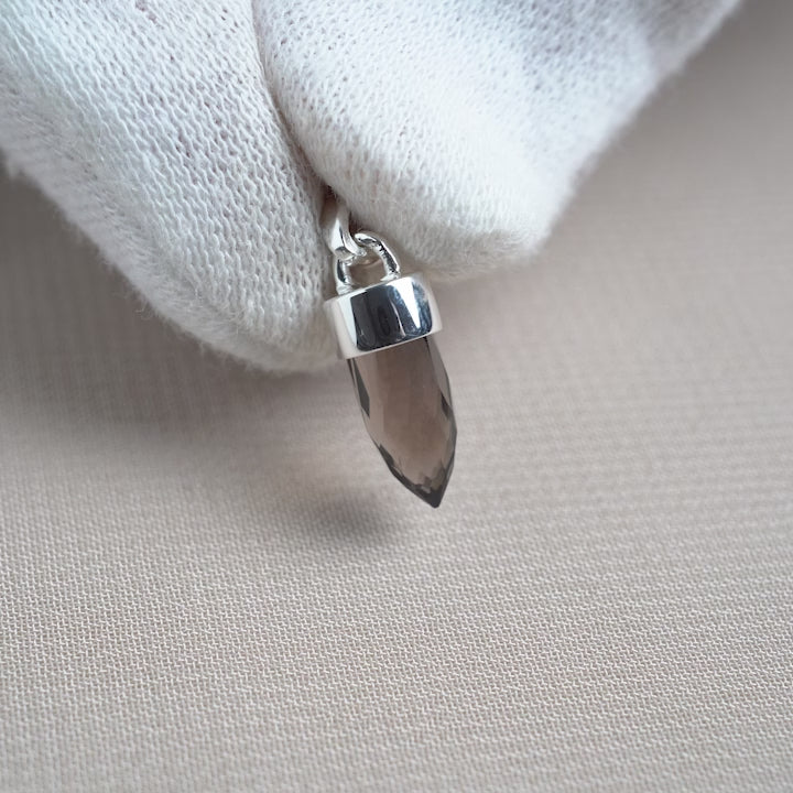 Gemstone charm with Smoky Quartz with silver details. Crystal Smoky quartz jewelry shaped intp a mini point to wear in necklace.