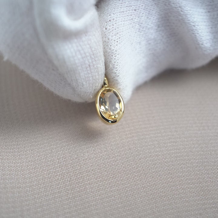 Birthstone charm with Citrine, the birthstone of November. Gold gemstone charm with yellow crystal Citrine.