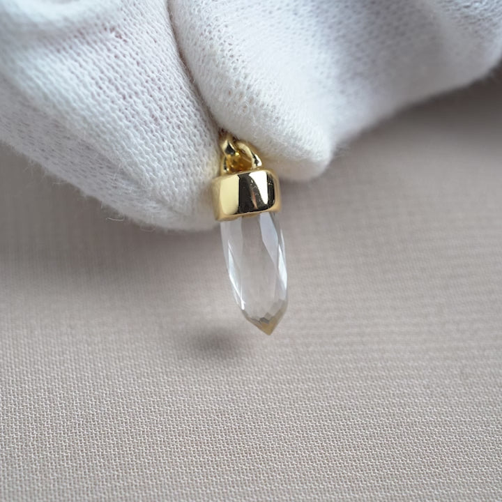 Clear Quartz mini point pendant with gold details. Cute and neat gemstone charm with Clear Quartz and gold.