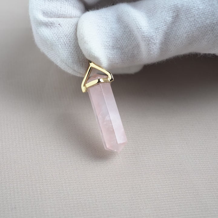 Pink gemstone Rose quartz charm in gold. Crystal pendant with point in Rose Quartz, which is October's birthstone.