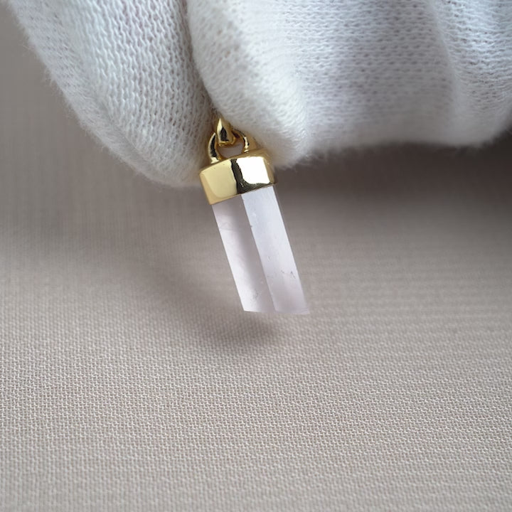 Crystal charm with Rose quartz in gold. Jewelry with crystal point Rose Quartz which is the birthstone of October.