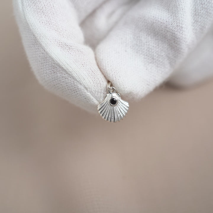 July birthstone pendant with a silver seashell.  Onyx pendant in seashell gemstone jewelry.