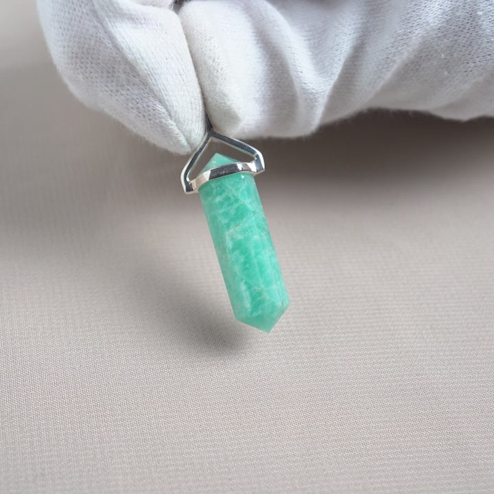 Amazonite pendant in silver. Gemstone point pendant with turquoise Amazonite crystal.