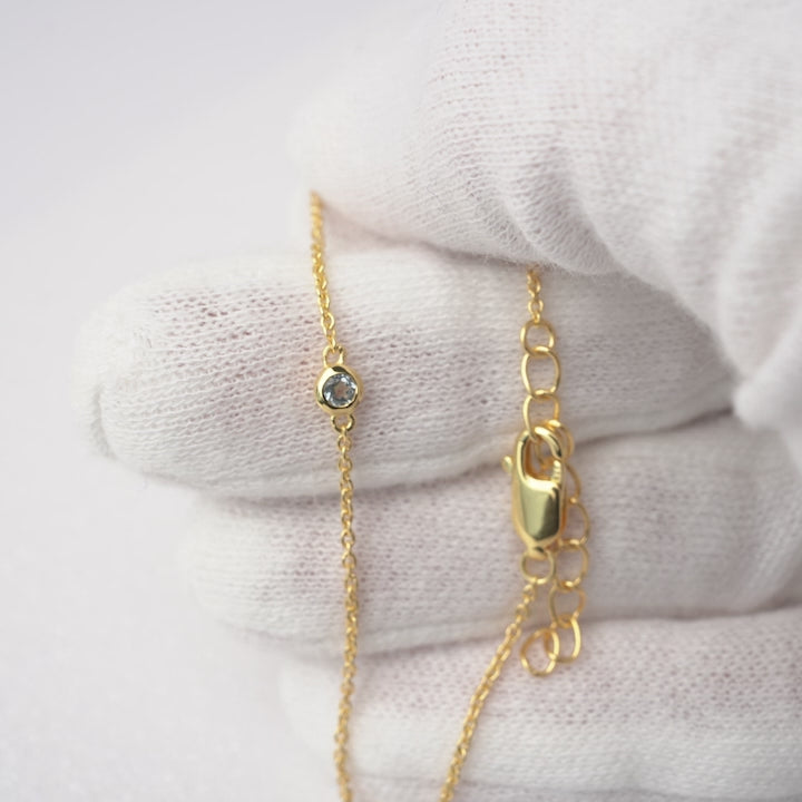 Gemstone bracelet in gold with Blue Topaz crystal. Crystal bracelet with Blue Topaz in gold.