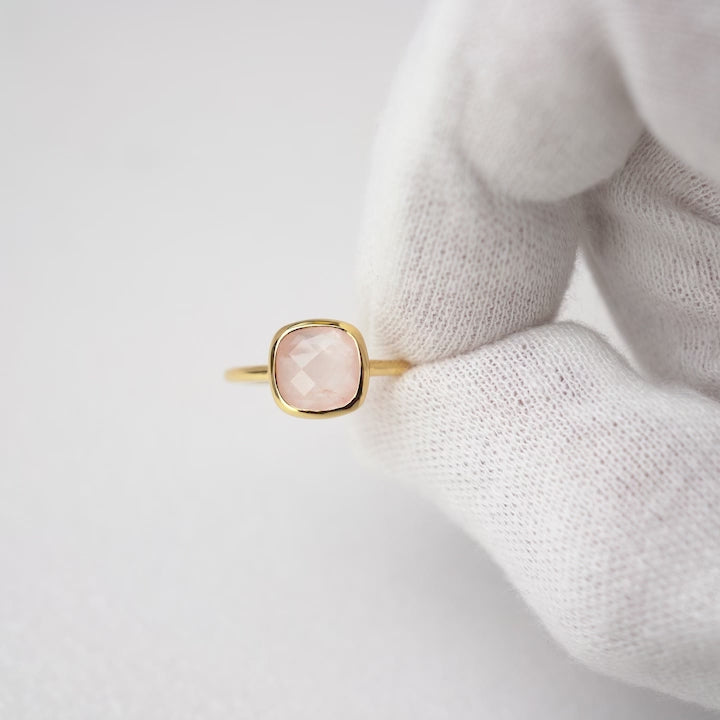 Pink gemstone ring made of Rose Quartz. Gold ring with pink gemstone Rose quartz that symbolizes love.