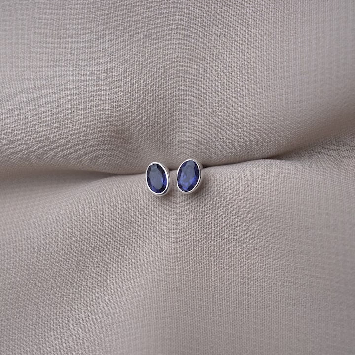 Crystal stud earrings with Iolite in silver. Gemstone earrings with purple, blue Iolite crystal.