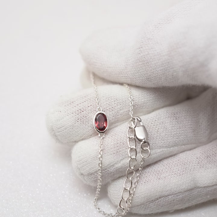 Bracelet with January birthstone Garnet. Gemstone bracelet with red crystal Garnet in Sterling Silver.