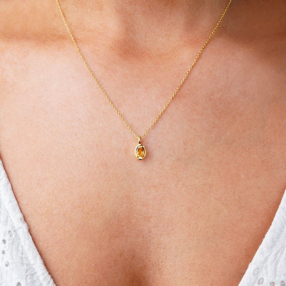 Necklace with yellow citrine, which is November's birthstone. Jewelery with yellow crystal Citrine to wear as a necklace in gold.