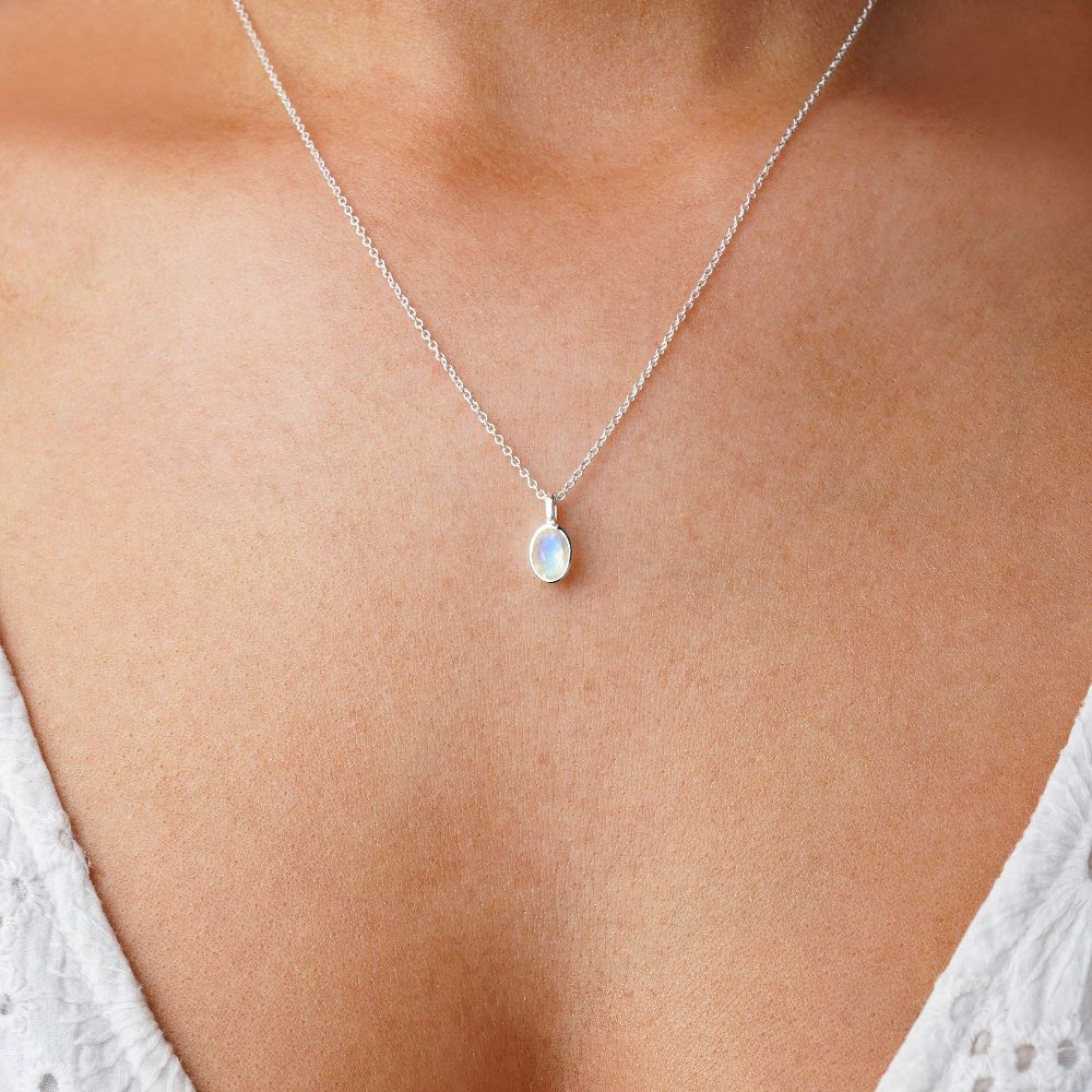 Silver necklace with Rainbow Moonstone, which is June's birthstone. Crystal jewelry with Moonstone that shimmers in blue and stands for feminine power.