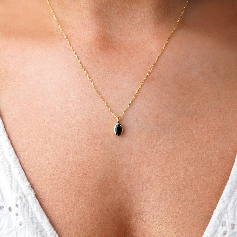 Necklace with black gemstone Onyx, which is the birthstone of July. Crystal jewelry with crystal Onyx that stands for success