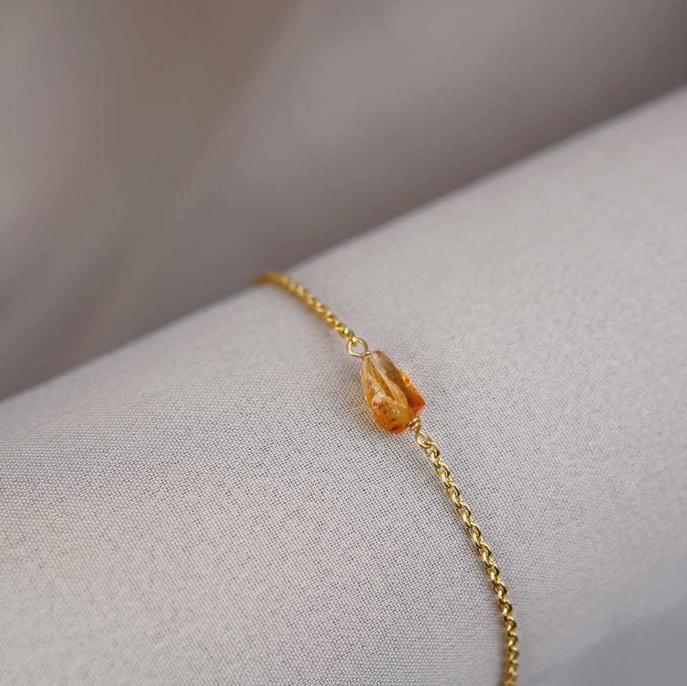 Crystal bracelet with small Citrine stone in gold. Gold bracelet with cute little yellow Citrine stone.