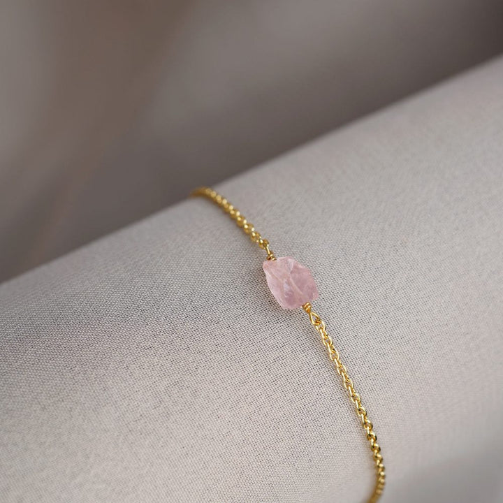 Rose quartz bracelet in gold. Crystal bracelet in gold with pink stone Rose Quartz, which symbolizes love.