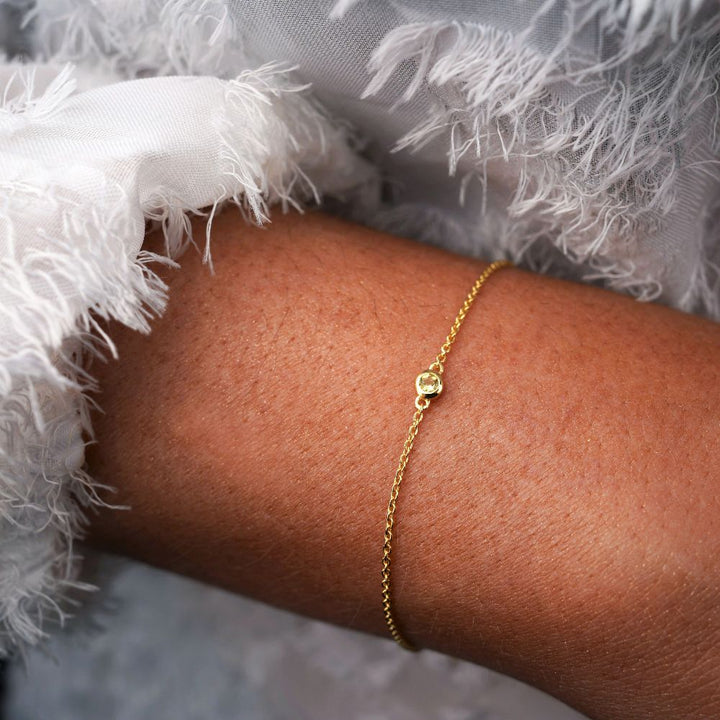 Gold bracelet with yellow Citrine crystal. Crystal bracelet with Citrine, which is November's birthstone.