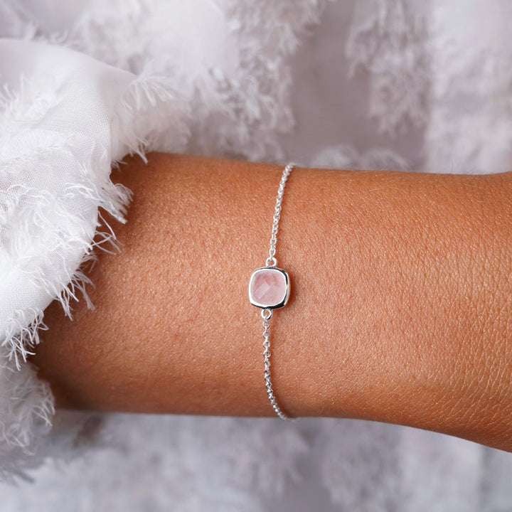 Silver bracelet with crystal Rose Quartz which is the birthstone of October. Gemstone bracelet with pink crystal Rose quartz that symbolizes love.