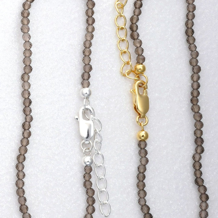 Smoky quartz necklace in silver and gold. Necklace with gemstone Smoky quartz that has a brown color.