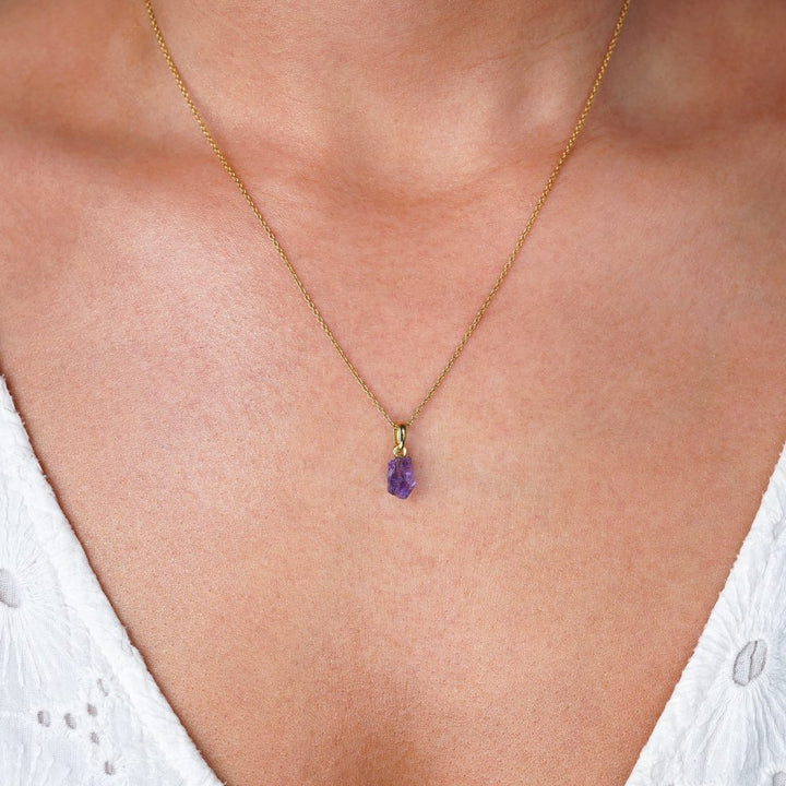 Amethyst necklace in gold. Necklace in gold with a cute gemstone charm in Amethyst. 