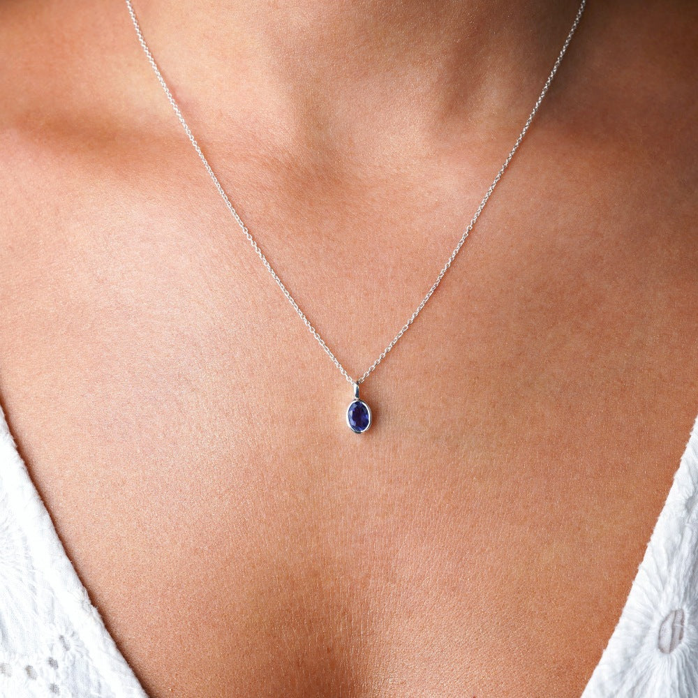 Silver necklace with crystal Iolite which is September's birthstone. Crystal necklace in silver with crystal Iolite.