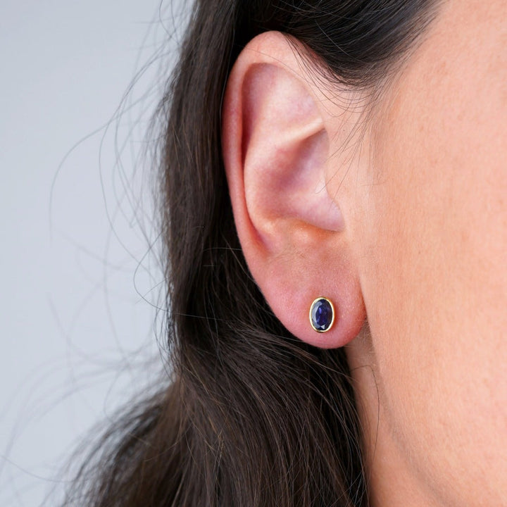 Crystal earrings with blue gemstone Iolite. Gold earrings with September birthstone Iolite.