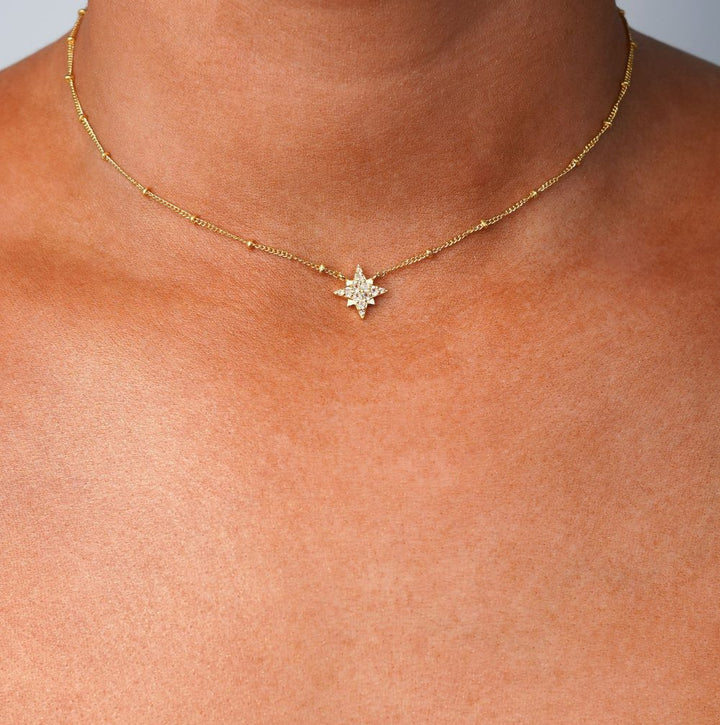 Gold necklace with star of White Topaz crystals. Star necklace in gold and real gemstones.