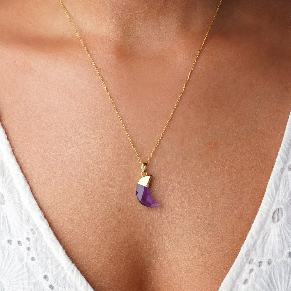 Amethyst necklace in moon shape. Crystal necklace with purple Amethyst with gold details.