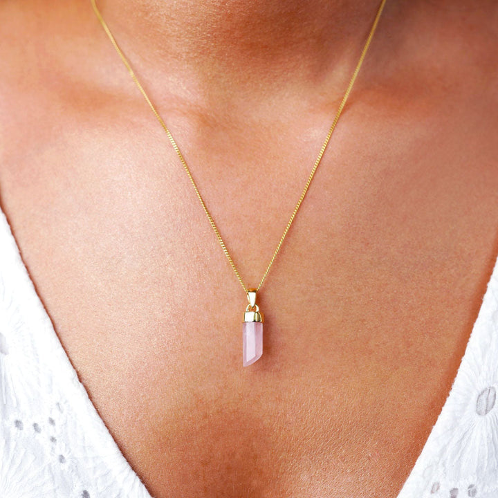 Crystal point with Rose quartz necklace. Jewelry with crystal point Rose Quartz which is the birthstone of October.
