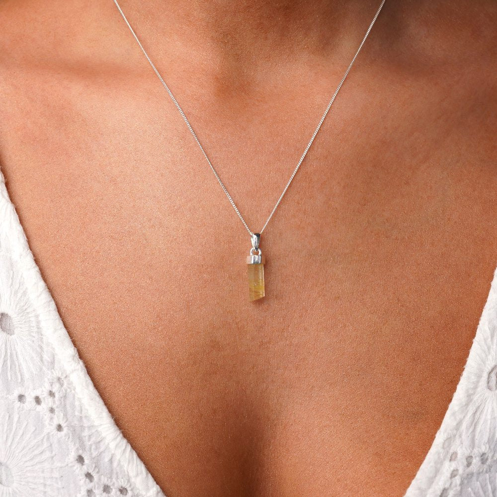 Rutile quartz necklace in silver that stands for happiness. Jewelry with crystal Rutile quartz for your necklace.