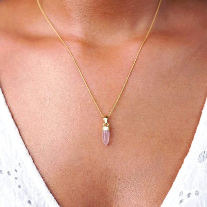 Necklace with mini point of Rose Quartz, which is October birthstone. Pink gemstone Rose quartz is the crystal of love and beautiful to wear in a necklace.