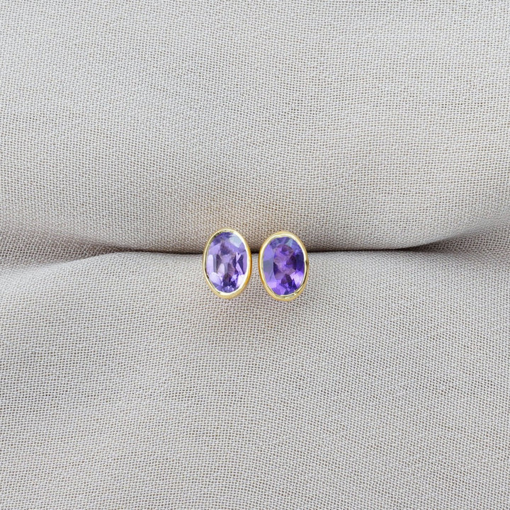  Crystal earrings with purple crystal Amethyst. February birthstone earrings with Amethyst in gold.